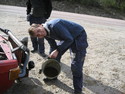 Emptying the condensated water canister.